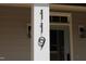 Close up of modern house numbers on porch post at 119 Water Ave, Wake Forest, NC 27587