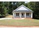Front view of charming craftsman style home at 119 Water Ave, Wake Forest, NC 27587