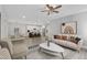 Open concept living room with kitchen and dining area at 119 Water Ave, Wake Forest, NC 27587