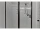 Clean shower with white subway tiles and glass enclosure at 119 Water Ave, Wake Forest, NC 27587