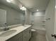 Bathroom featuring double sink vanity with granite countertop and tiled floor at 484 Traditions Grande Blvd # 29, Wake Forest, NC 27587