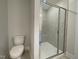 Bathroom featuring a glass shower and a toilet at 484 Traditions Grande Blvd # 29, Wake Forest, NC 27587