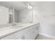 Bathroom featuring double sinks, granite countertops, large mirror, and tiled floors at 484 Traditions Grande Blvd # 29, Wake Forest, NC 27587