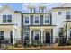 Charming two-story gray and white townhouse with black trim at 484 Traditions Grande Blvd # 29, Wake Forest, NC 27587