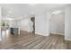 Bright living room with recessed lighting, multiple closets, stairs, and seamless flow into the kitchen at 484 Traditions Grande Blvd # 29, Wake Forest, NC 27587