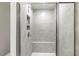 Tiled shower with a built-in seat and niche for toiletries at 484 Traditions Grande Blvd # 29, Wake Forest, NC 27587