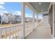 Covered front porch overlooking street at 9237 Kitchin Farms Way # 429, Wake Forest, NC 27587
