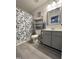 Well-maintained bathroom with modern fixtures, shelving, and a shower-tub combo at 129 Sturbridge Dr # 15, Clayton, NC 27520
