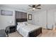 Bright bedroom with a ceiling fan, comfortable bed, and modern decor, including a gray and white comforter at 129 Sturbridge Dr # 15, Clayton, NC 27520