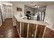 Modern kitchen with stainless steel appliances, white countertops, and a breakfast bar at 129 Sturbridge Dr # 15, Clayton, NC 27520