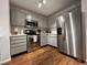 A well-equipped kitchen with stainless steel appliances and ample counter space is perfect for cooking and entertaining at 129 Sturbridge Dr # 15, Clayton, NC 27520