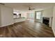 Open floor plan showcasing the living room and kitchen area, featuring hardwood floors at 207 Earnest Way # 15, Kenly, NC 27542