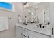 Bright bathroom featuring double vanity sinks with modern finishes at 2401 E Main St, Durham, NC 27703