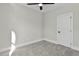 Bright bedroom featuring soft carpet and a closet at 2401 E Main St, Durham, NC 27703