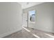 Bright bedroom featuring soft carpet and a window with a view at 2401 E Main St, Durham, NC 27703