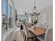 Open concept dining room and living room features natural light and modern finishes at 2401 E Main St, Durham, NC 27703
