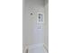 Laundry room with washer and dryer hookups and gray walls at 2401 E Main St, Durham, NC 27703