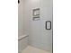 Close-up of modern shower with seat and shampoo niche at 2401 E Main St, Durham, NC 27703