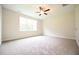 Bedroom with neutral carpet, a ceiling fan and lots of natural light at 138 Abingdon Farms Dr, Selma, NC 27576