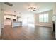 Open-concept living room and kitchen area with hardwood floors at 138 Abingdon Farms Dr, Selma, NC 27576