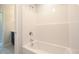 Neutral tone bathroom with a white tub-shower combo at 236 Abingdon Farms Dr, Selma, NC 27576