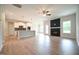 Bright living room showcasing hardwood floors, fireplace, and ample space for entertaining and relaxing at 236 Abingdon Farms Dr, Selma, NC 27576
