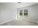 Bright bedroom with natural light and neutral carpet at 733 Portland Rose Dr, Knightdale, NC 27545