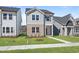 Charming two-story home with a landscaped yard and covered front entrance at 733 Portland Rose Dr, Knightdale, NC 27545