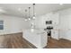 Modern kitchen features a marble island and stainless steel appliances at 733 Portland Rose Dr, Knightdale, NC 27545