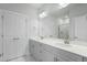 Bathroom featuring double sinks and a large mirror at 737 Portland Rose Dr, Knightdale, NC 27545