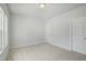 Cozy bedroom with neutral carpet and white trim at 737 Portland Rose Dr, Knightdale, NC 27545