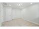 Neutral bedroom with a closet, carpeted floor, and a simple light fixture providing ample storage space at 737 Portland Rose Dr, Knightdale, NC 27545