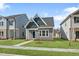 Inviting home exterior with a manicured lawn and blue sky at 737 Portland Rose Dr, Knightdale, NC 27545