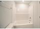 Bathroom with a shower and bathtub combination with modern fixtures at 76 Abingdon Farms Dr, Selma, NC 27576
