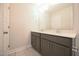 Modern bathroom with double vanity, sleek countertops, and contemporary fixtures at 76 Abingdon Farms Dr, Selma, NC 27576