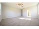 Bright, open room with carpeting and neutral walls offers many design possibilities at 76 Abingdon Farms Dr, Selma, NC 27576