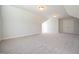 Large bonus room featuring carpet and overhead lighting at 76 Abingdon Farms Dr, Selma, NC 27576