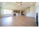 Bright and open living space flows seamlessly into a kitchen with a large island and modern appliances at 76 Abingdon Farms Dr, Selma, NC 27576