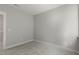 This is a simple bedroom painted in a neutral light gray, new carpeting, and white trim at 1660 Piney Falls Dr, Wendell, NC 27591