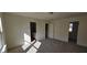Spacious bedroom includes carpet, ensuite bathroom, and walk-in closet at 19 Longdale Dr, Graham, NC 27253