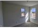 Bedroom featuring neutral carpet and two windows that provide lots of natural light at 19 Longdale Dr, Graham, NC 27253