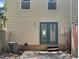Back exterior with patio and access door at 7220 Shellburne Dr, Raleigh, NC 27612