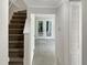 Interior stairs leading to the upper level of the home at 7220 Shellburne Dr, Raleigh, NC 27612