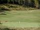 Lush golf course features manicured greens, mature trees, and a sand trap at , Pittsboro, NC 27312