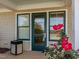 Exterior of the golf shop and restrooms with green trim, surrounded by lush floral landscaping at , Pittsboro, NC 27312