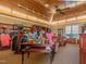 The Golf Shop at Chapel Ridge with wood ceiling, displays, clothing, and seating at , Pittsboro, NC 27312
