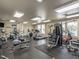 Well-lit gym area featuring modern exercise equipment for residents' fitness needs at , Pittsboro, NC 27312