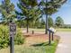 Chapel Ridge golf course tee sign at the first tee surrounded by trees and the golf course at , Pittsboro, NC 27312
