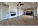 Open-concept layout connecting the living room and kitchen, highlighting modern design and functionality at 23 S Mistflower St, Clayton, NC 27520