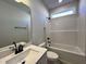 Bathroom featuring a vanity, toilet, shower, and tub at 238 Bluejay St, Clayton, NC 27520